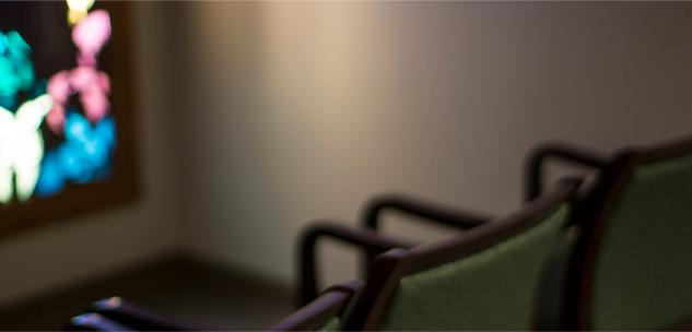 chairs and stained glass in the interfaith center