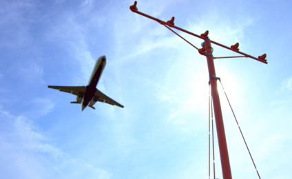 Silhouette of an airplane flying above
